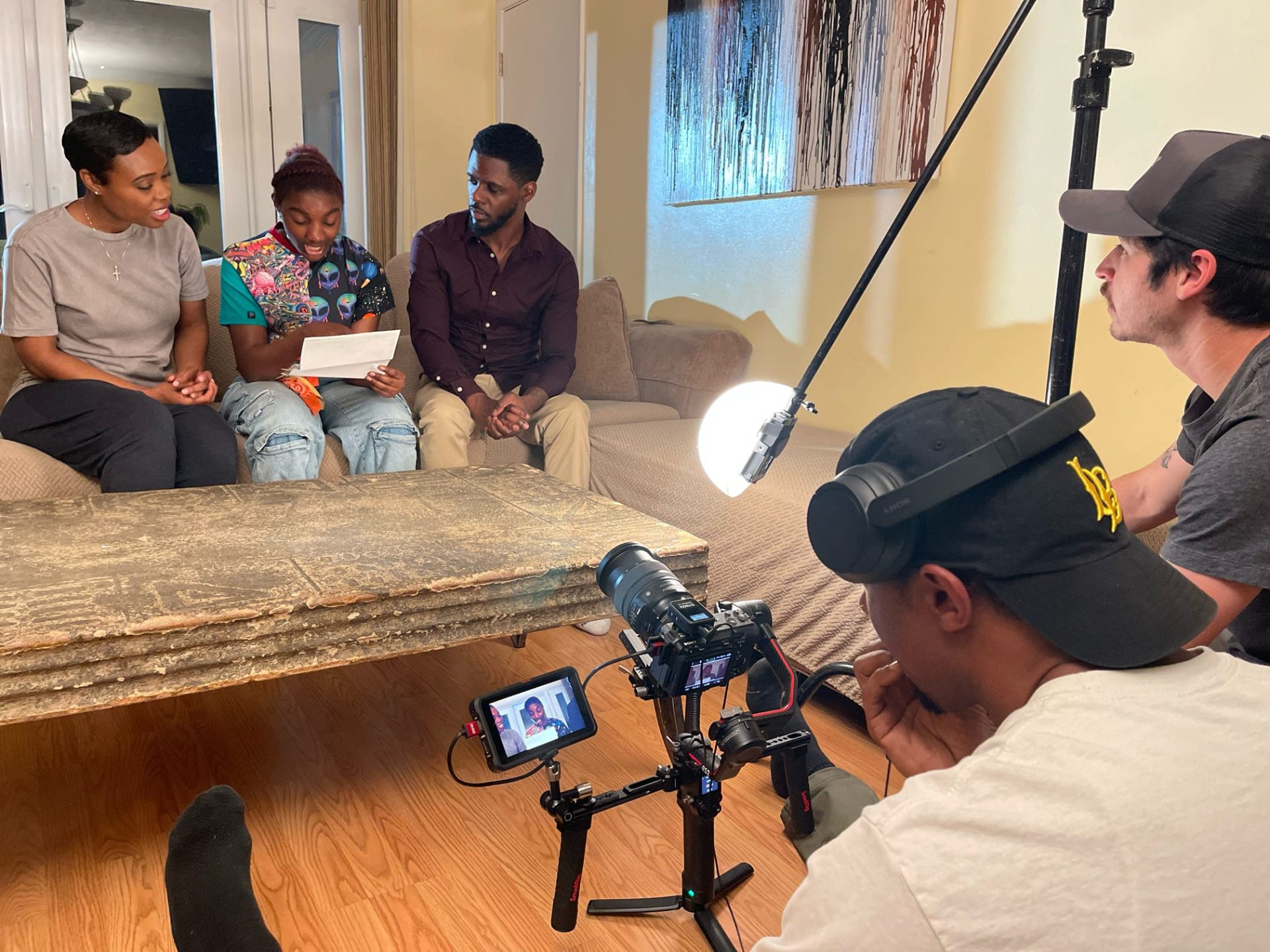Documentary interview lit with a boom mic and gimbal rig