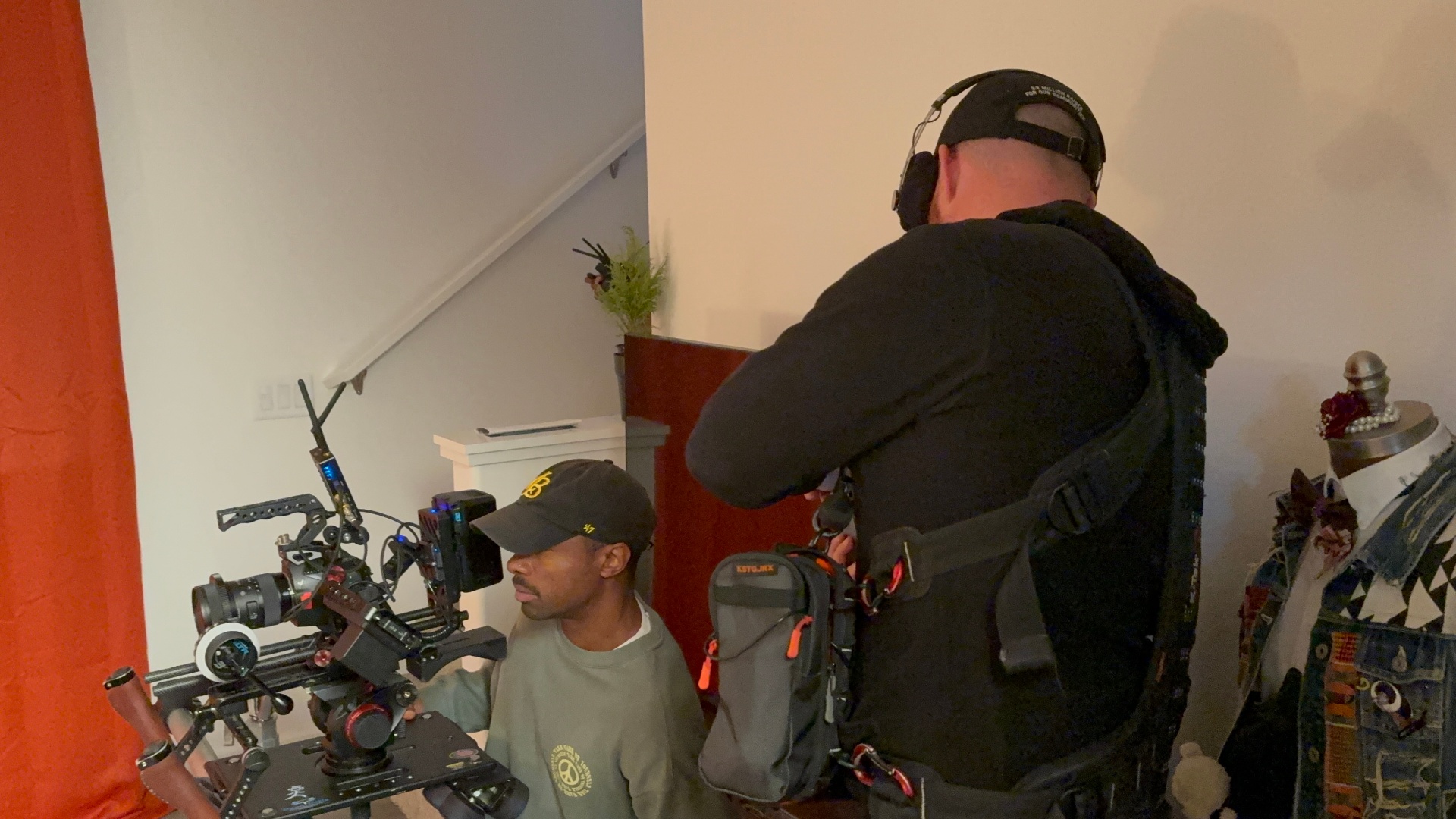 Q operating a Movi rig on a graffiti-covered location