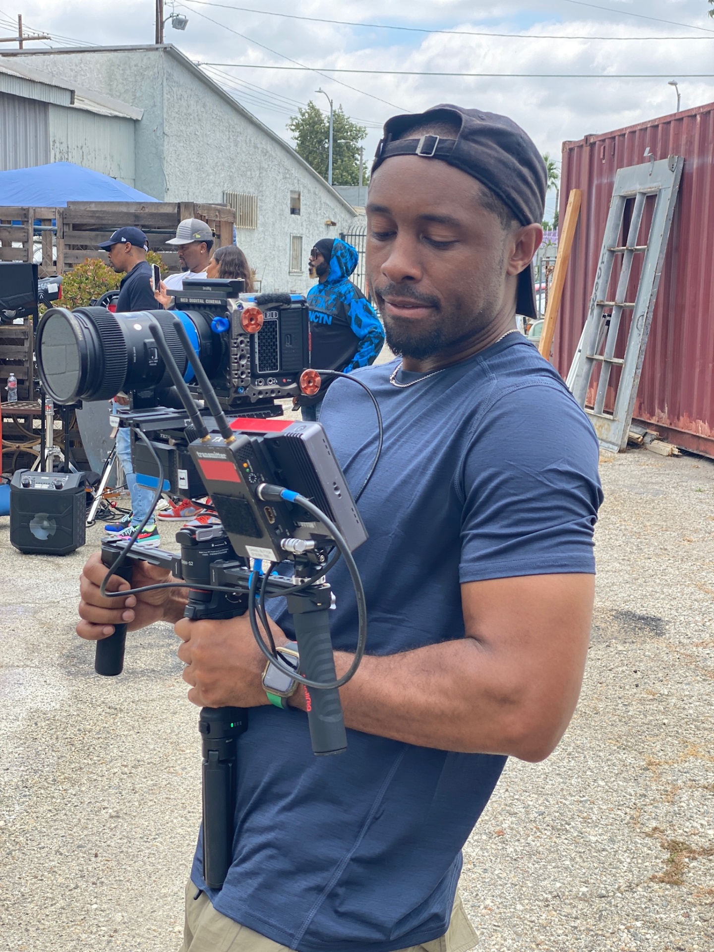 Red camera setup in a downtown LA alley