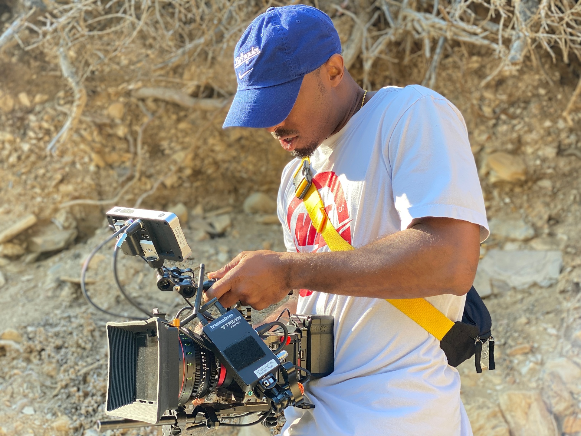 Camera rig on set with a Dodgers cap