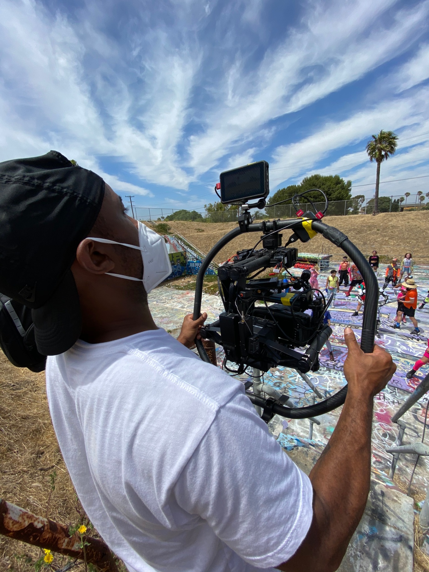 Operator flying the MoVI ring rig at the LA river graffiti pit
